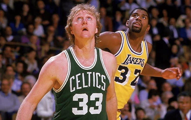 Larry Bird playing for the Boston Celtics vs Magic Johnson for the Lakers