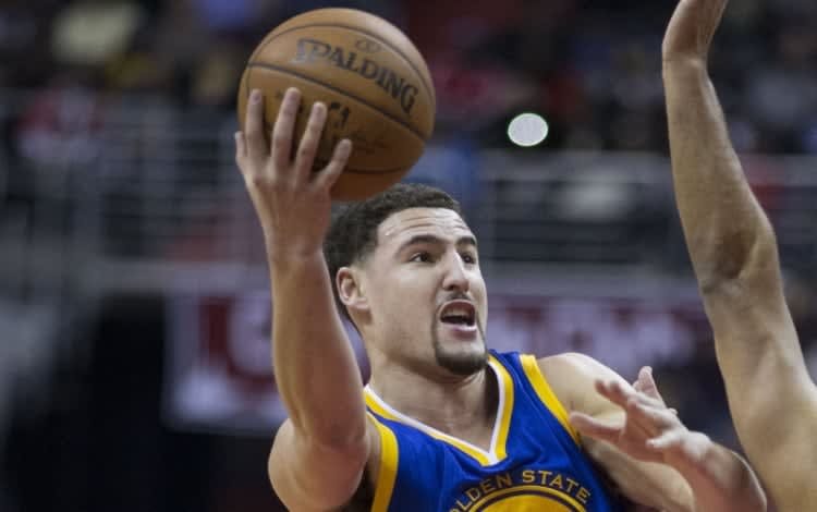 Klay Thompson playing for the Golden State Warriors
