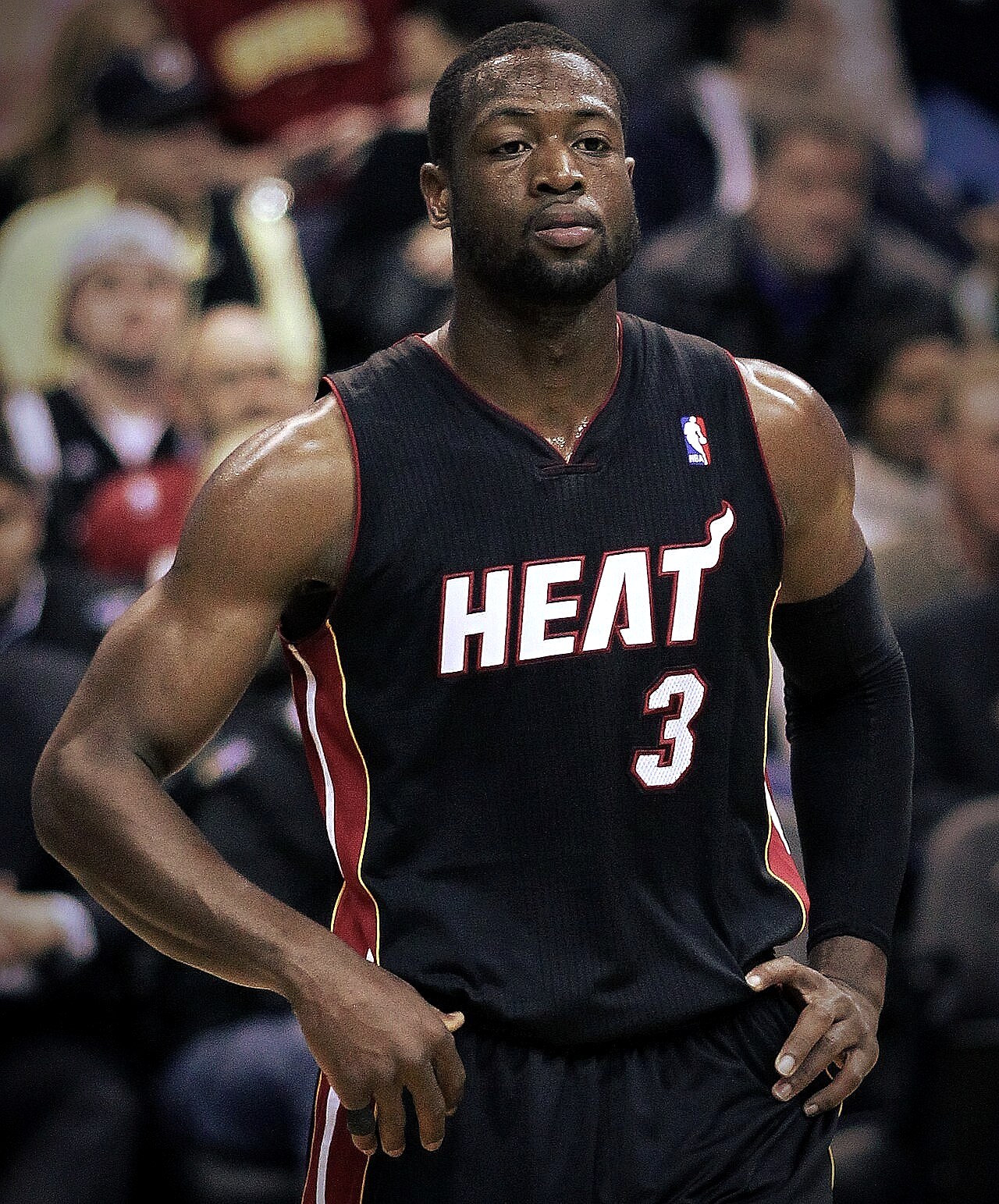 Dwyane Wade in a Miami Heat uniform driving to the basket