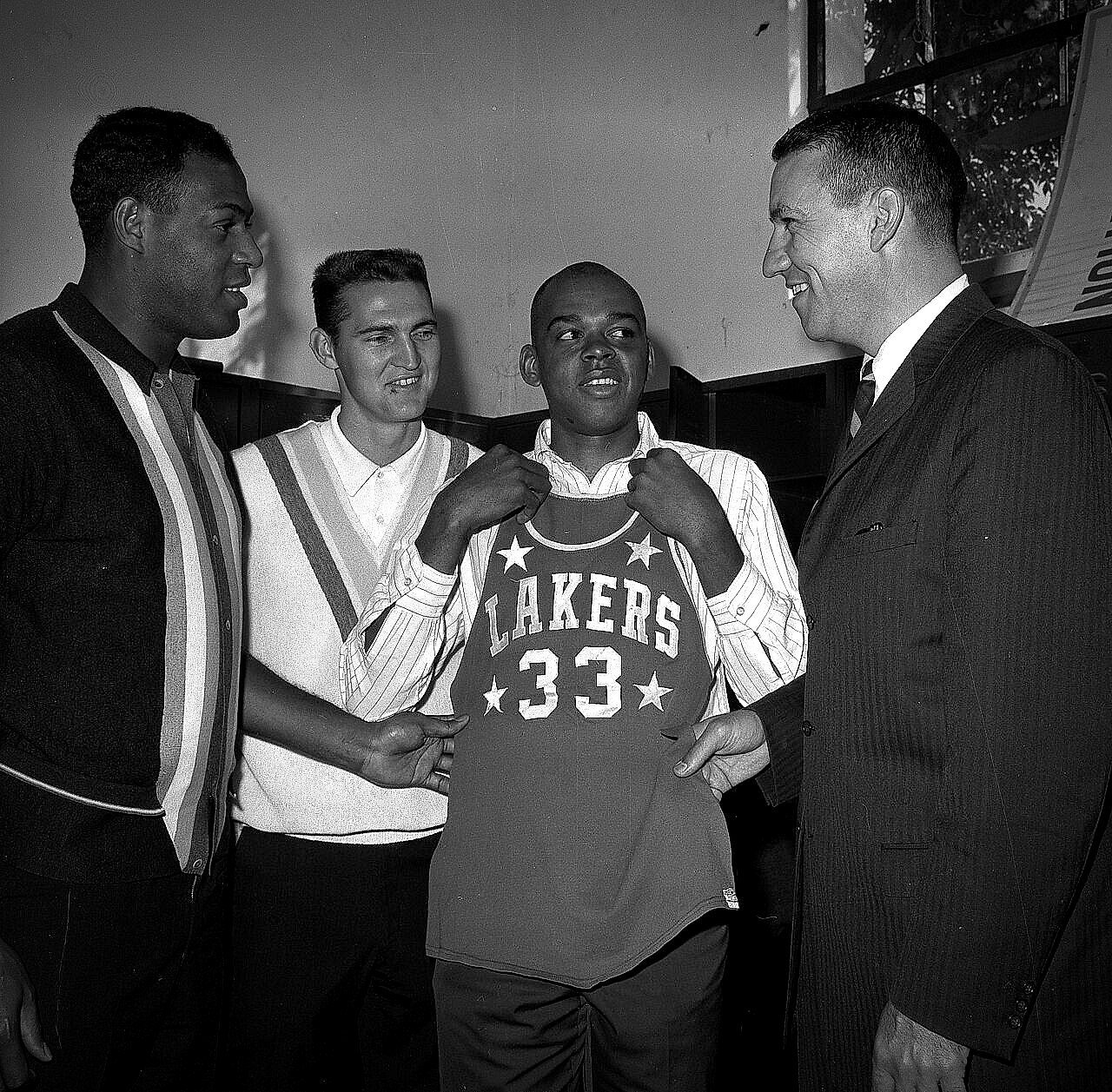 Elgin Baylor with Jerry West, Walt Hazzard, and coach Fred Schaus, Los Angeles Lakers, 1964