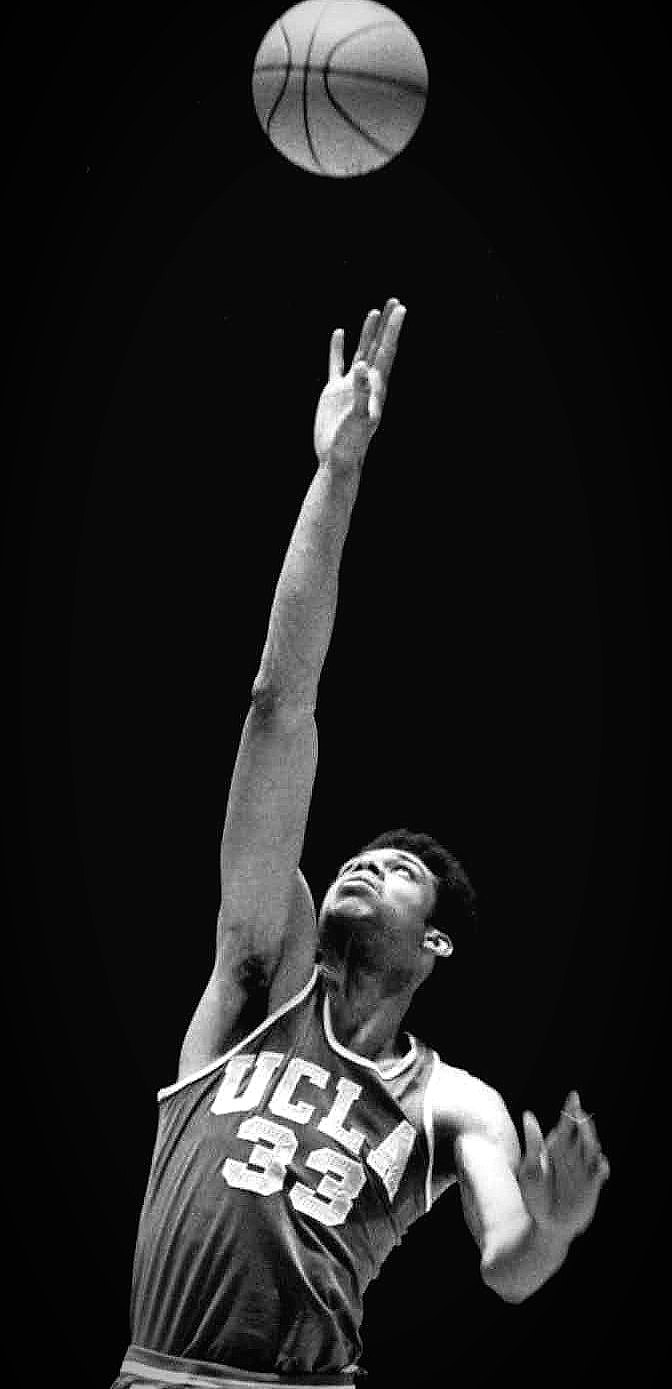 Lew Alcindor releasing a shot in a UCLA number 33 uniform in 1969