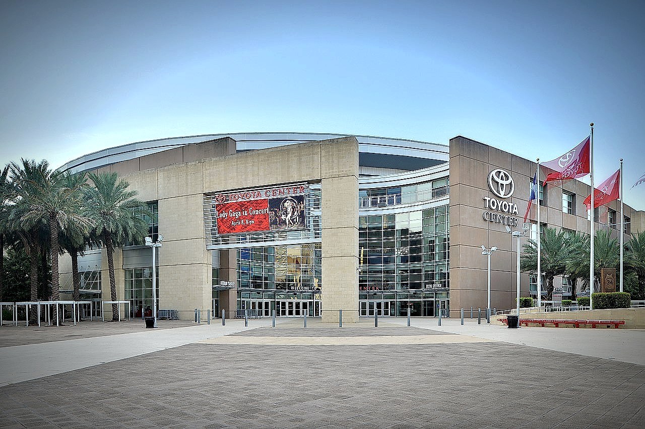 NBA arena interior in the style of Toyota Center, the Rockets' downtown Houston home